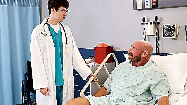 Twink fucks muscular man in the ass on the hospital bed