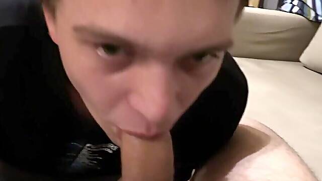 Clothed boy keeps sucking the cock until sperm begins to drop on his lips
