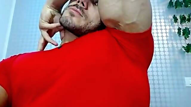 Shredded Bodybuilder Flexing in Red Spandex Klaus Kasper