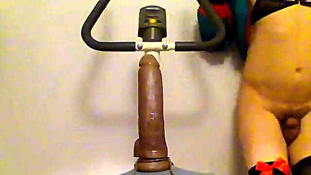 Sissy Rides Dildo on a Bike