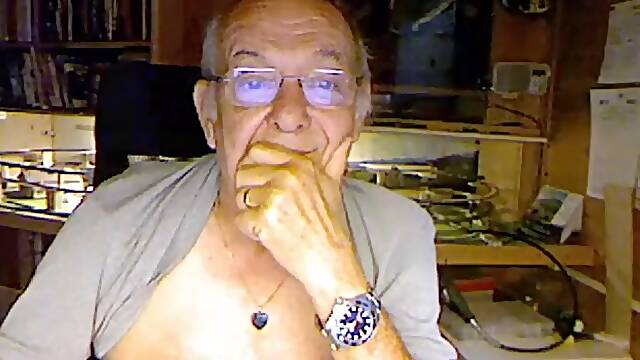 70 year old man on webcam with sexy face