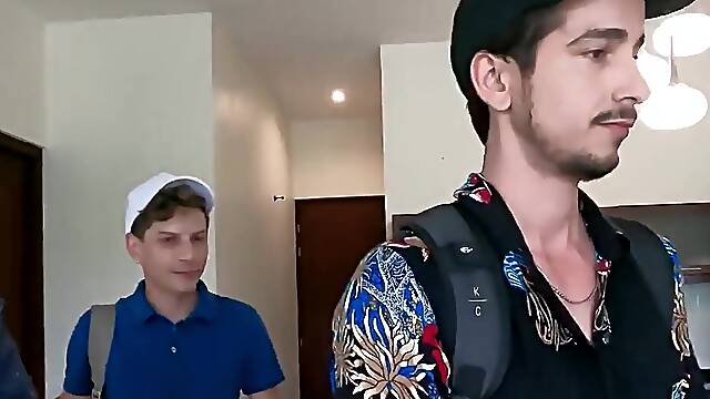 Muscular Latino and a pale lad having raw sex on the sofa