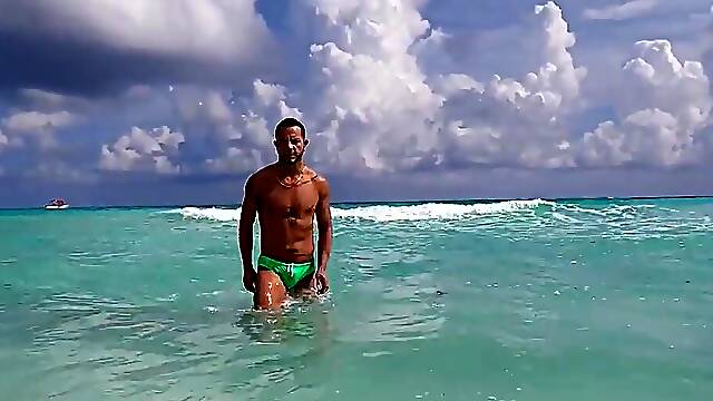 Masturbating in front of the cameraman and sucking him too