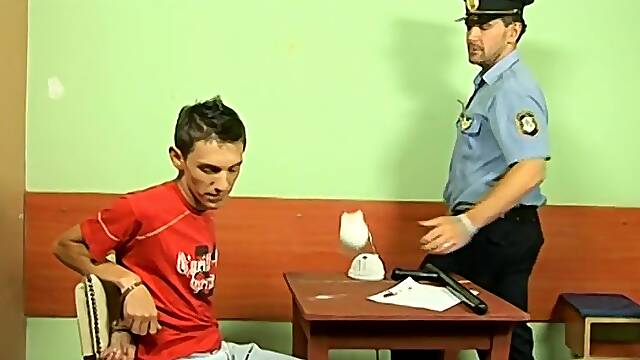 Police officer Roberts bangs hot twink Ian on a office desk