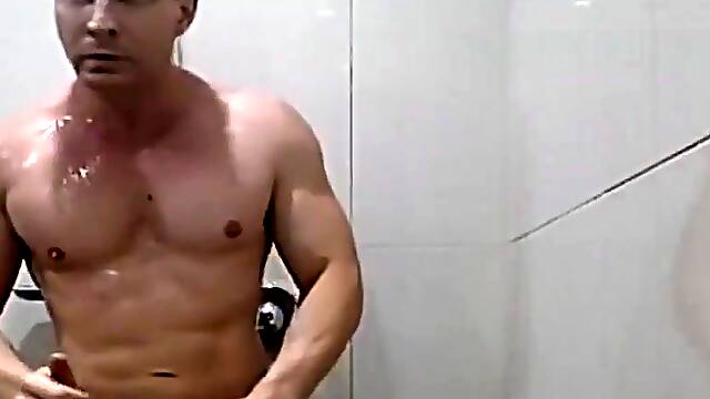 Sexy muscle guy takes Hot shower and suds up + wet clothes preview