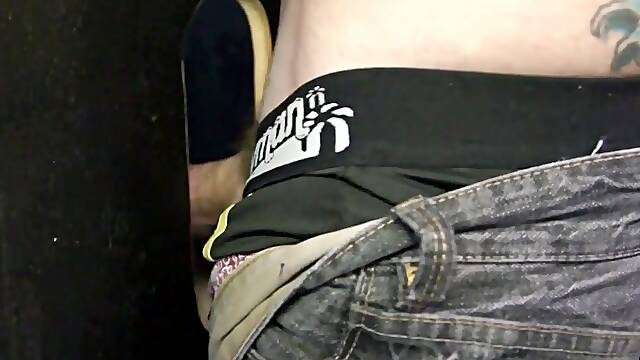Tattooed man fucks a twink guy with tight ass after getting his big cock sucked trough gloryhole