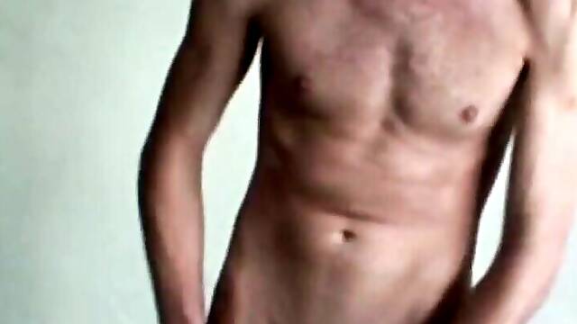 Skinny punk is showcasing his body while masturbating solo