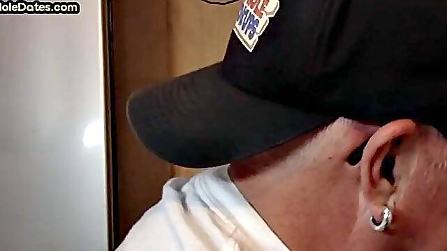 Mature DILF with glasses at gloryhole sucks neighbors dick