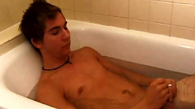 Brock is spending some down time in the bathtub reading a magazine and stroking his cock. After edging himself a few times, it doesnt take long to spew a warm load of cum onto his face.