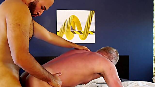 Angel Ferrari feeds bearded Dale Savage his fat uncut shaft before breeding his ass