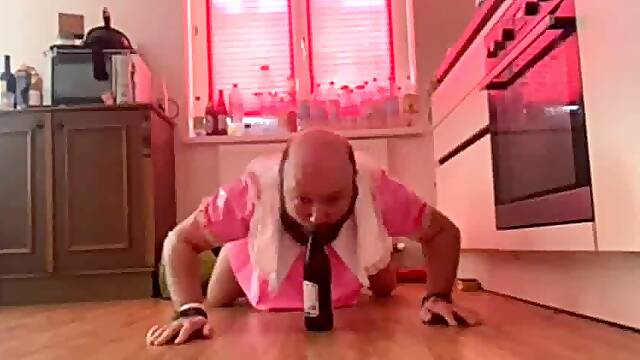 Sissy Andreas giving a bottle blow Job