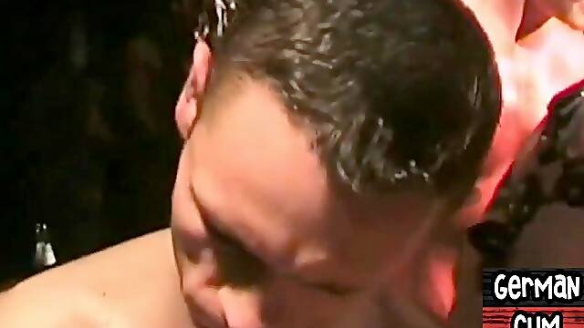 Athletic German blows dick and tastes cum in gangbang