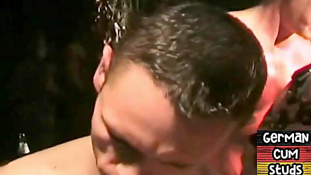 Cum loving German stud with mask gangbanged in sling