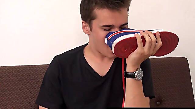 Pervert twink alternates between feet licking and cock stroking