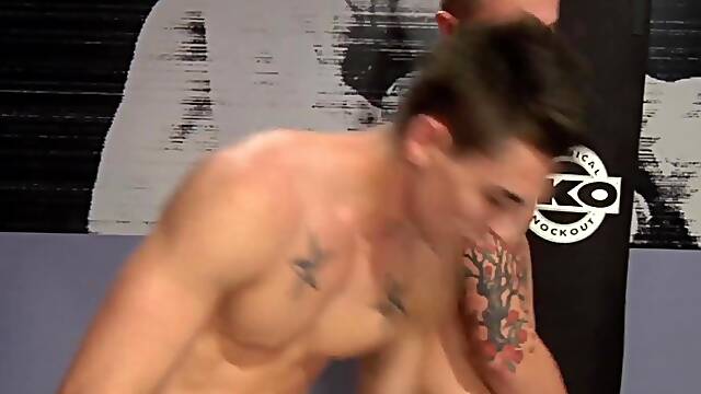 Johnny Torque bends James Ryder over the boxing bag and pound his ass