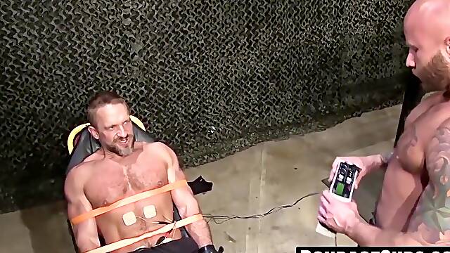 Hairy european soldier Dirk Caber screams with pleasure while being tied up and electro stimulated