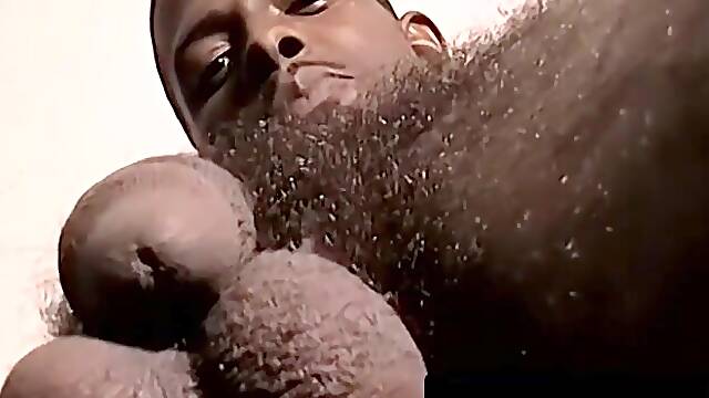 Skinny perv cums hard while masturbating to TV porn