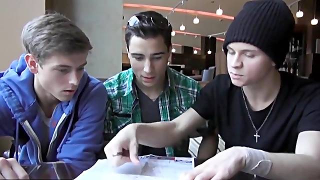 Handsome gays kissing and stripping in from of the camera