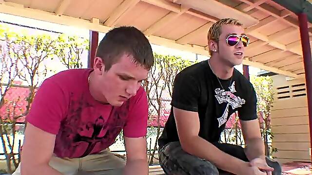 Fine gay guy with short blonde hair sucking a stranger's cock