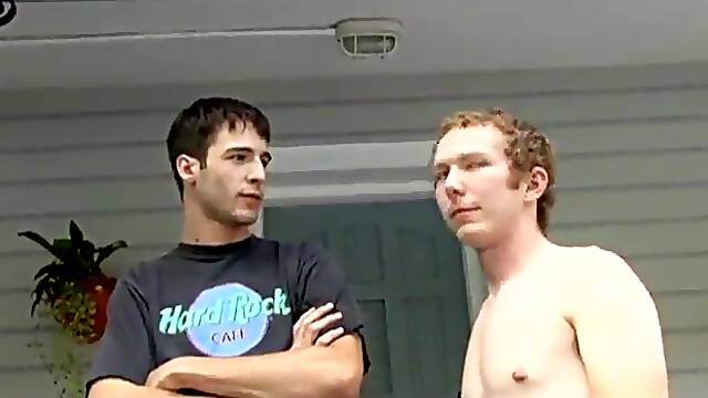 Cute gay guy with short curly hair enjoying a cock suck next to his swimming pool