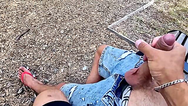 A random femboy jerks my ramrod and eats my cum in a public park