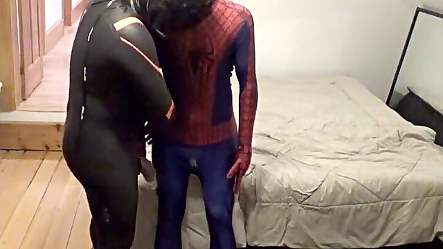 Dark-hued haired rubber drone pulverizes spiderman bang-out doll