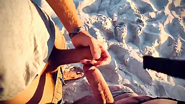 Knocking shafts cocks with thick cums in a paradise beach at sunset