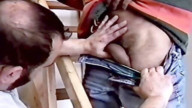 Stud displaying his suck off abilities in retro gay video