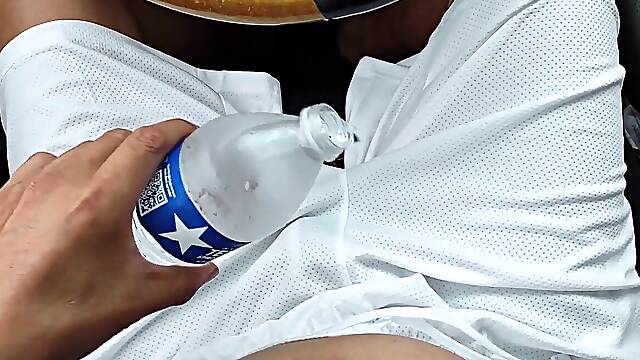 Showcasing off my zipper underwear with removable cod lump, pouring water onto my white shorts