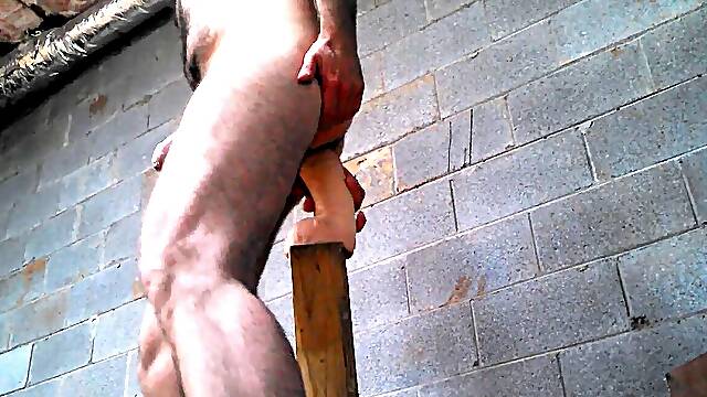 Bare Jon Scarecrow plundering his booty with a enormous dildo in heels