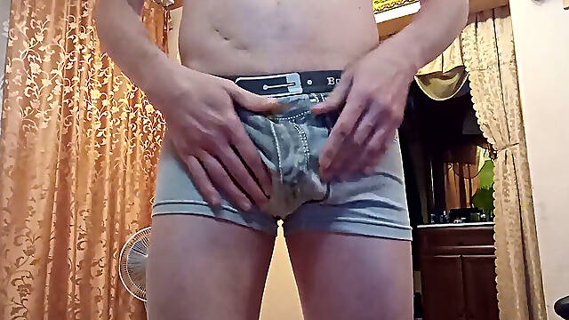 Stroking off with a plaything