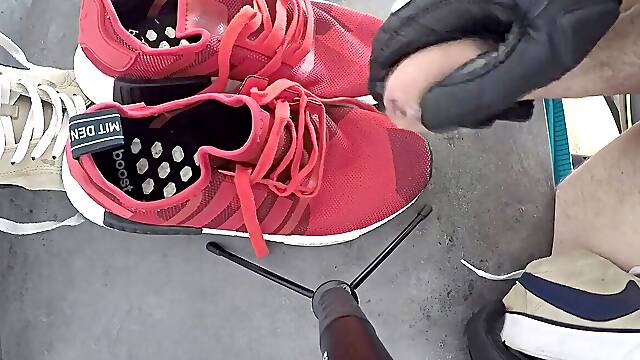 Teenagers hefty pop-shot on his Adidas NMD
