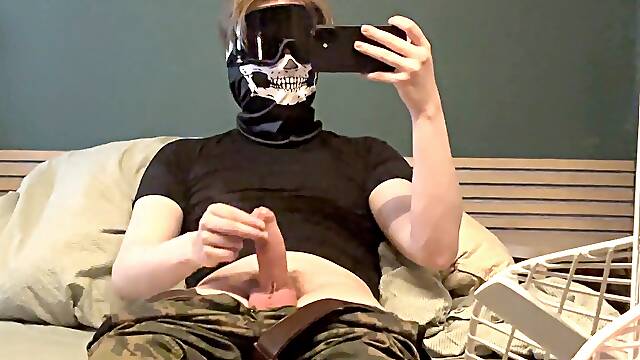 Hooded armytwink tugging off
