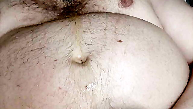 Fat bear pissing in his own mouth