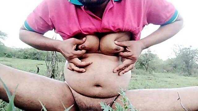 Sexy boy goes to the forest and presses his boobs by covering his clothes. Boy licks his nipple and shakes his sexy cock.