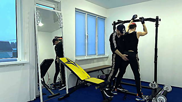 The cocky trainer got excited on the student and fucked him right in the gym hall