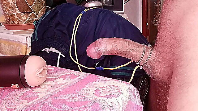 Guy intensively fucks a rubber pussy and cums inside. ASMR moans POV