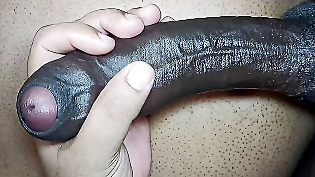My partner and I masturbate a friend with a huge thick and black penis.