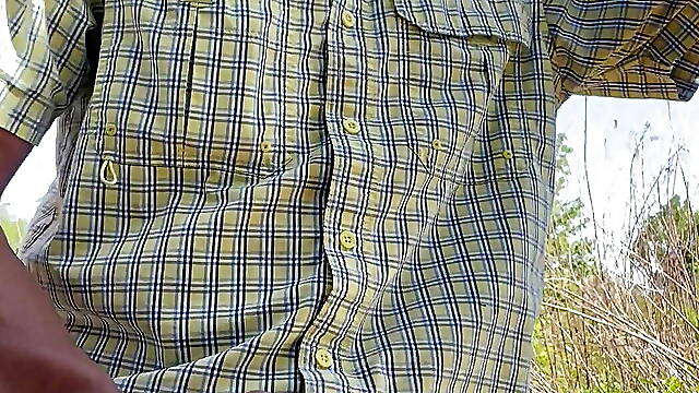 Log trucker handles his wood in the woods.