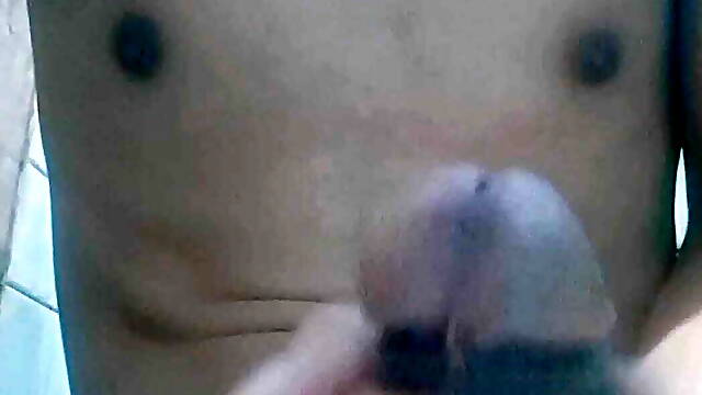 Like a long banana, the man shook his genitals.