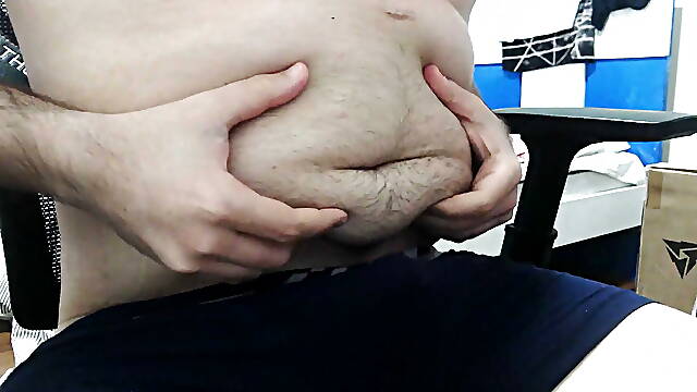 Chubby guy playing with his dick and cums on himself