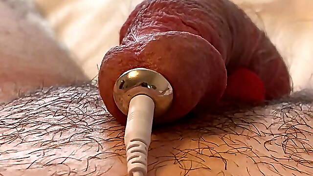 Fucking my prostate with electro ejaculation a long prostate sound and penis plug with electrode in my ass