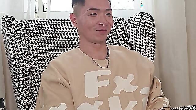 Toned Japanese guy strips and gets oiled up in his wrestling bodysuit