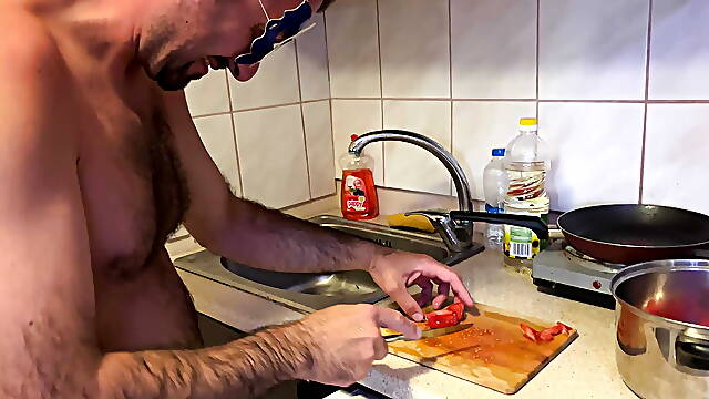 Earl cooks naked in the kitchen