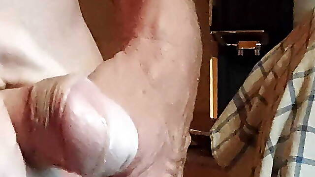 Creamy cumshot in a glass