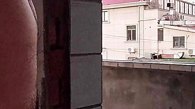 Naked wandering around a broken house on the side of a busy road and masturbating