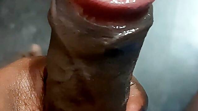 A south asian young man is involved in self-pleasure at his residence.