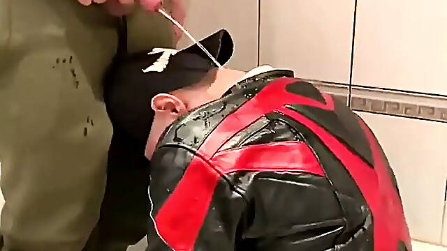 Big Man in Leather Jacket Pissing on Leather Moto Biker
