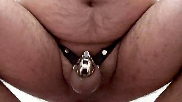 Dildo squirt in chastity