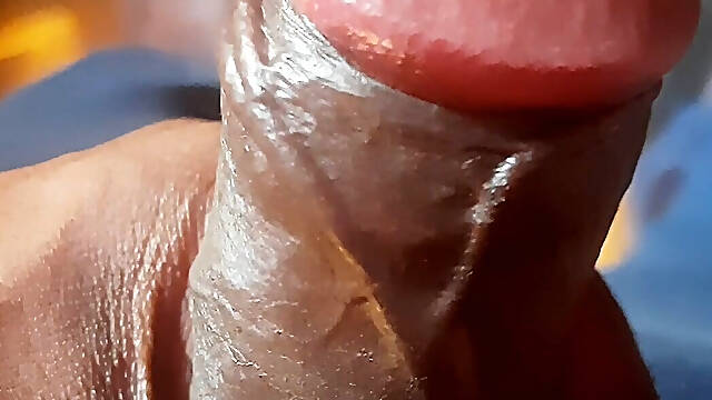 A south asian youth is enjoying self-pleasure in his home.